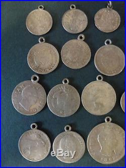 29 x SMALL WORLD SILVER COINS, MOUNTED AS CHARMS, PLUS A MINIATURE CRIMEA MEDAL