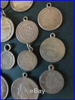 29 x SMALL WORLD SILVER COINS, MOUNTED AS CHARMS, PLUS A MINIATURE CRIMEA MEDAL