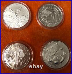 Collection of 8 Different 2022 BU World Silver Coins in a Wooden Display Case