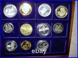 LOT OF 11 COMMEMORATIVE WORLD WAR II COINS In WOOD CASE 1.999 SILVER