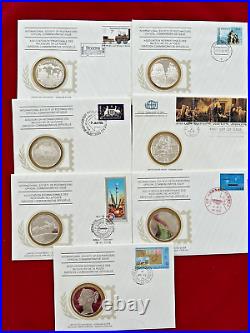 Lot of 7 First Day Cover Stamp/Envelope with Sterling Commemorative Coin