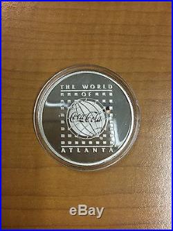 The World of CocaCola Atlanta Centennial Olympics'96 1oz Silver Round Bar Coin