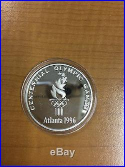 The World of CocaCola Atlanta Centennial Olympics'96 1oz Silver Round Bar Coin